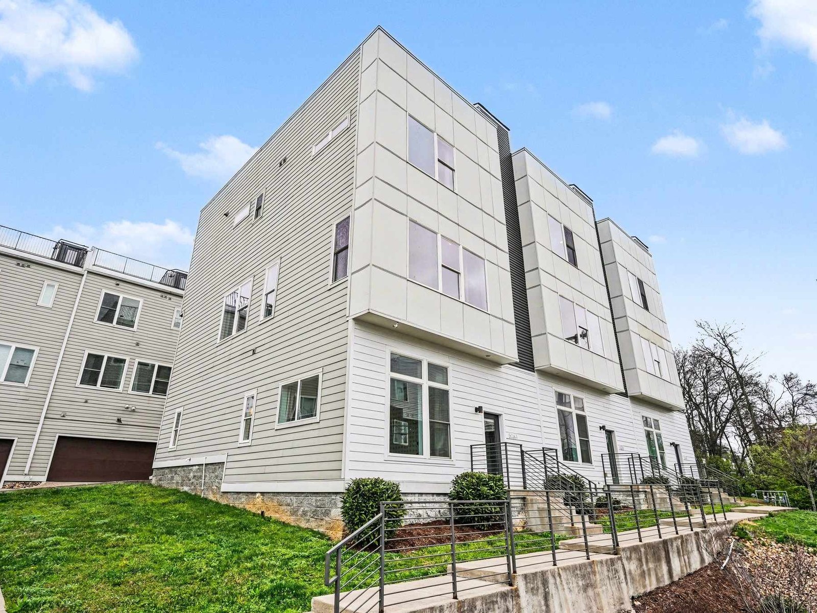 White three-story Nashville townhome exterior