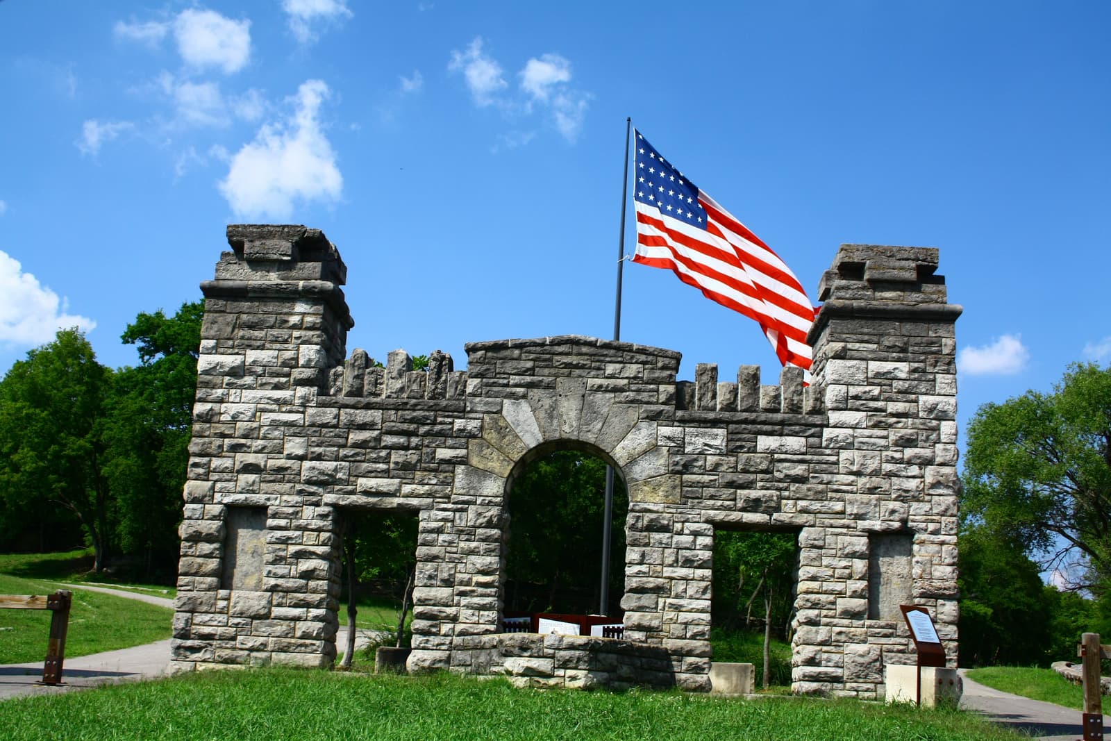 The stone gate of Fort Negley Park under an American flag, at the edge of Wedgewood-Houston, Nashville